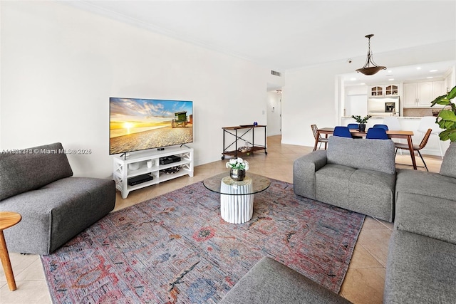 tiled living room with ornamental molding