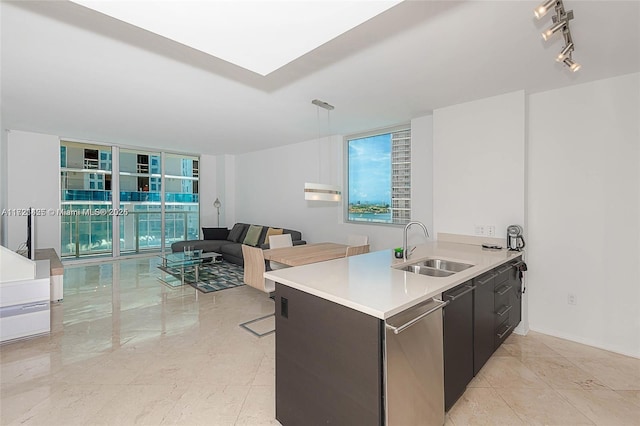 55 SE 6th St Unit 1507, Miami, FL 33131 - kitchen with a sink, dishwasher, light countertops, modern cabinets, and open floor plan