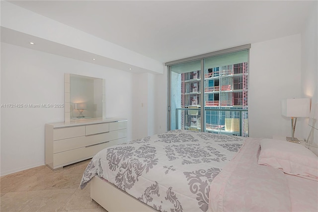 55 SE 6th St Unit 1507, Miami, FL 33131 - bedroom featuring expansive windows and recessed lighting