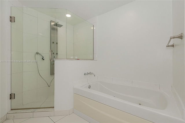 55 SE 6th St Unit 1507, Miami, FL 33131 - full bath featuring a tub with jets, a shower stall, tile patterned flooring, and recessed lighting