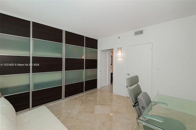 55 SE 6th St Unit 1507, Miami, FL 33131 - office area featuring marble finish flooring