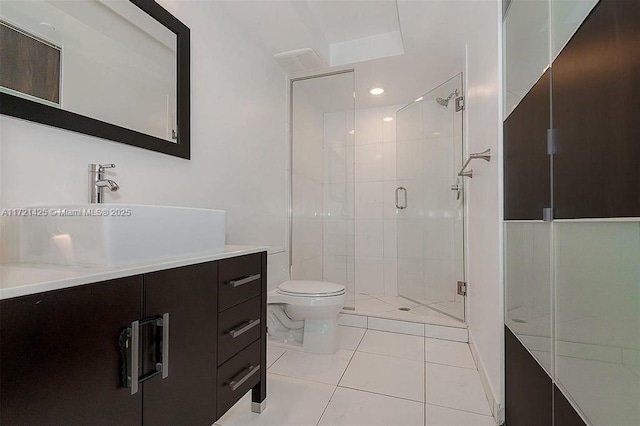 55 SE 6th St Unit 1507, Miami, FL 33131 - full bathroom featuring a shower stall, toilet, vanity, and tile patterned floors