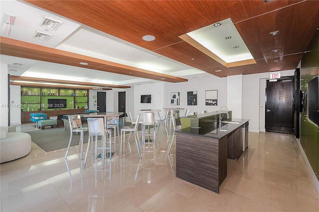 55 SE 6th St Unit 1507, Miami, FL 33131 - kitchen featuring modern cabinets, a sink, a kitchen island with sink, and open floor plan