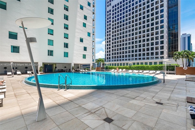 55 SE 6th St Unit 1507, Miami, FL 33131 - community pool featuring a patio area