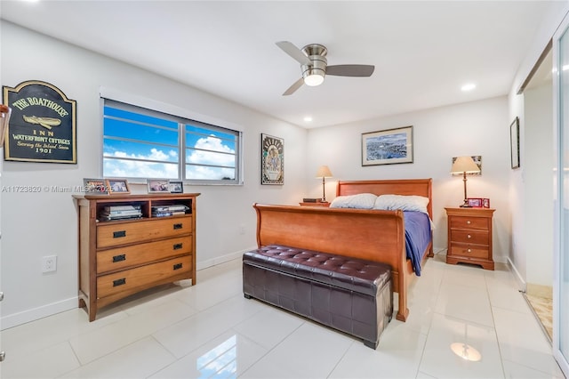 tiled bedroom with ceiling fan