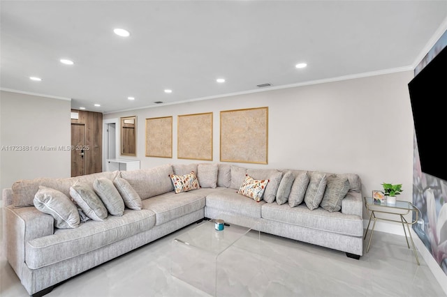 living room featuring crown molding