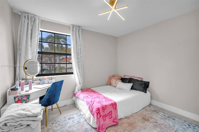 bedroom with a chandelier