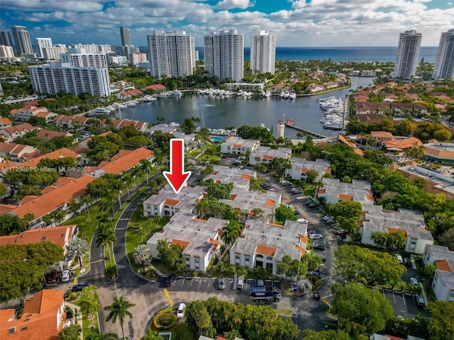 birds eye view of property featuring a water view