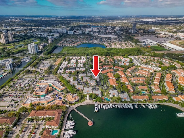 birds eye view of property featuring a water view