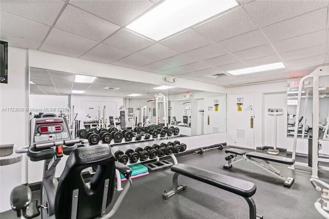 gym with a drop ceiling