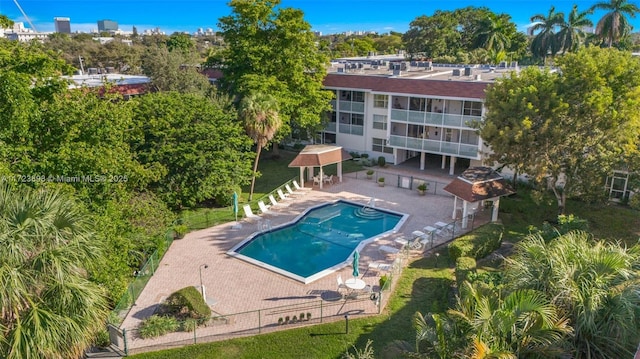 view of swimming pool featuring a patio area