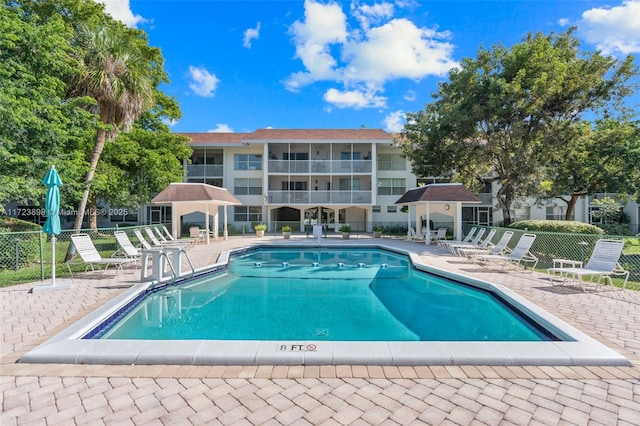 view of swimming pool featuring a patio