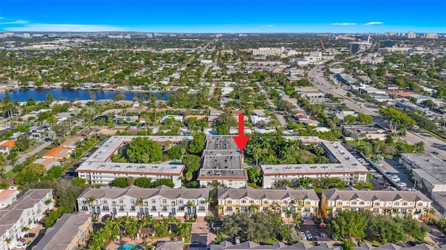 birds eye view of property featuring a water view