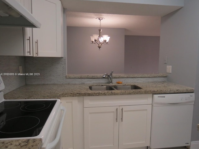 kitchen with white cabinets, white appliances, sink, and hanging light fixtures