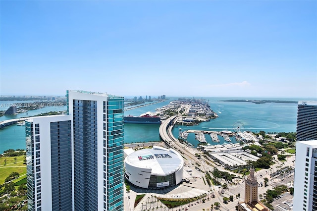 birds eye view of property featuring a water view