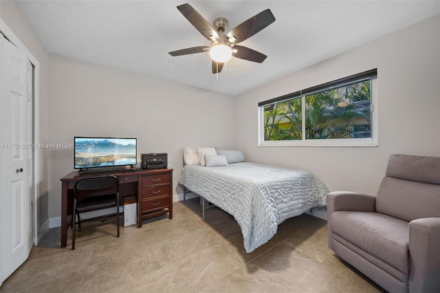 bedroom with a closet and ceiling fan