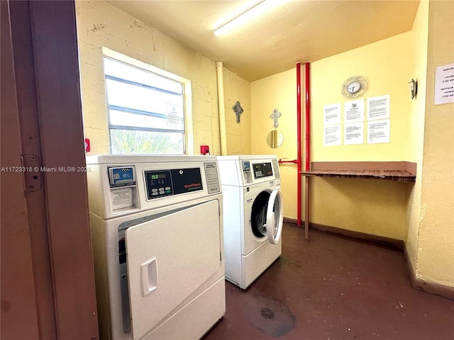 laundry area with washer and clothes dryer