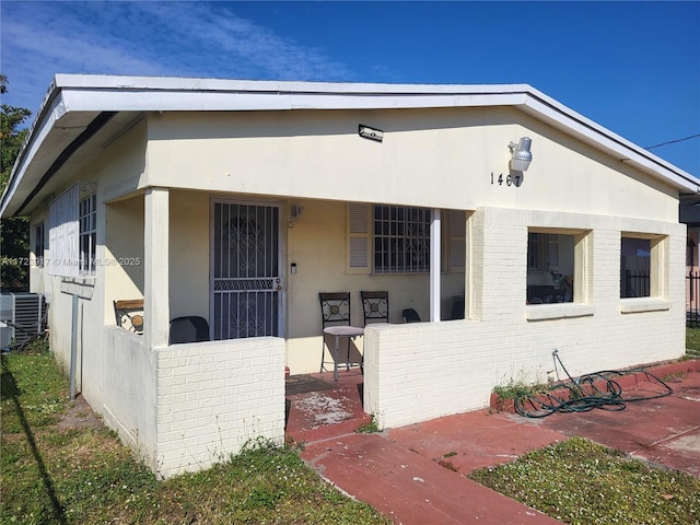 view of front of property featuring central AC unit