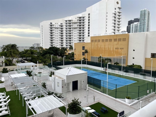 exterior space featuring tennis court