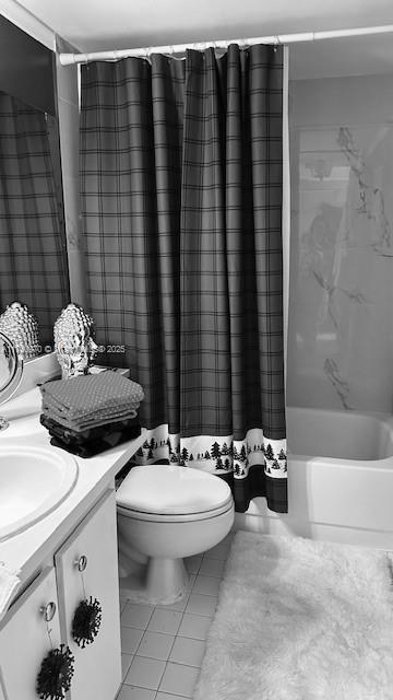 full bathroom featuring toilet, vanity, shower / tub combo, and tile patterned flooring