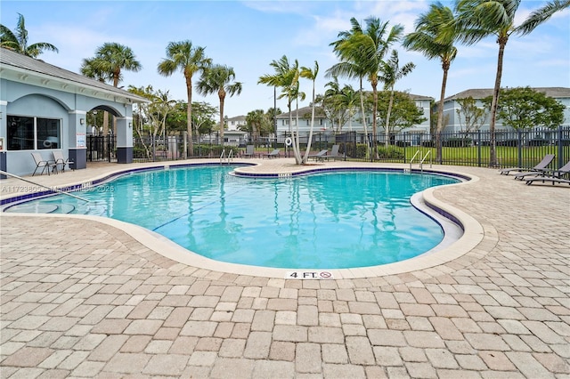 view of pool featuring a patio