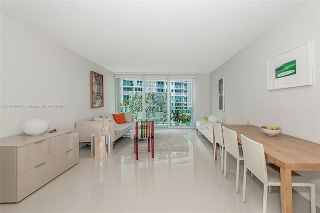 bedroom featuring floor to ceiling windows