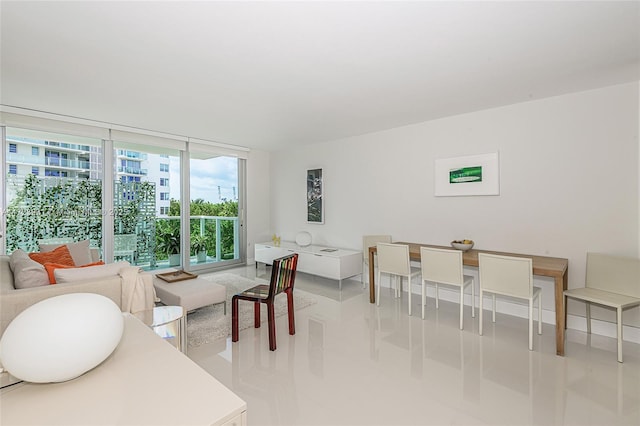 dining room with floor to ceiling windows