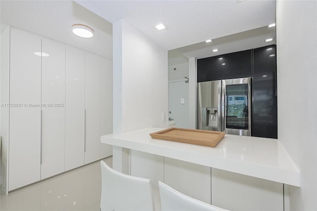 bathroom featuring tile patterned flooring