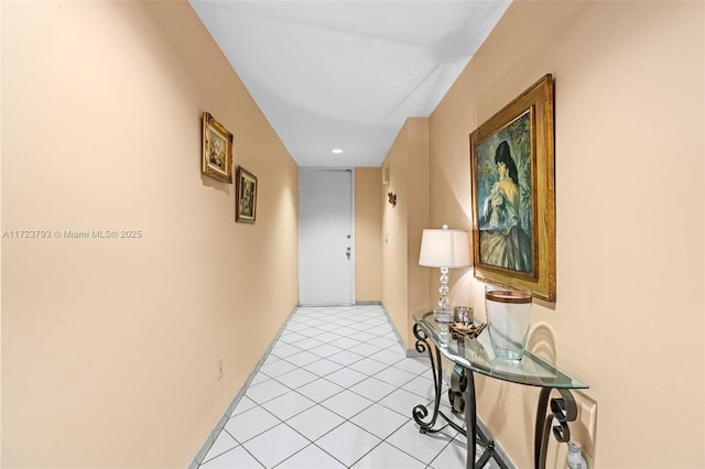 corridor featuring light tile patterned floors