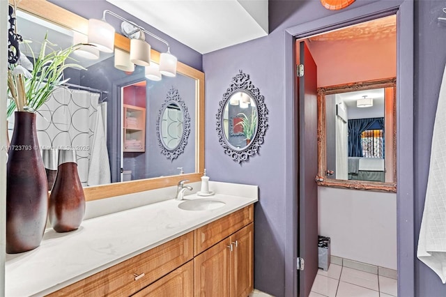 bathroom with vanity and tile patterned floors