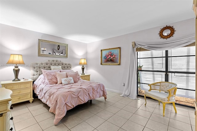 bedroom featuring light tile patterned floors