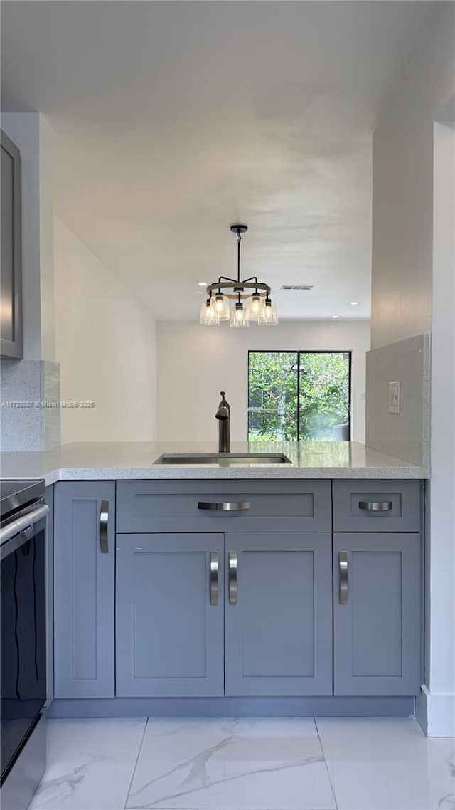 6850 NW 173rd Dr Unit 103, Hialeah, FL 33015 - kitchen featuring stainless steel electric range oven, gray cabinets, a peninsula, light marble finish flooring, and pendant lighting