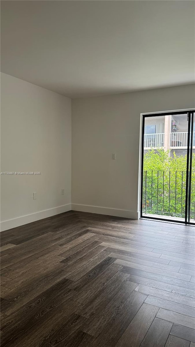 6850 NW 173rd Dr Unit 103, Hialeah, FL 33015 - unfurnished room featuring dark wood-style floors