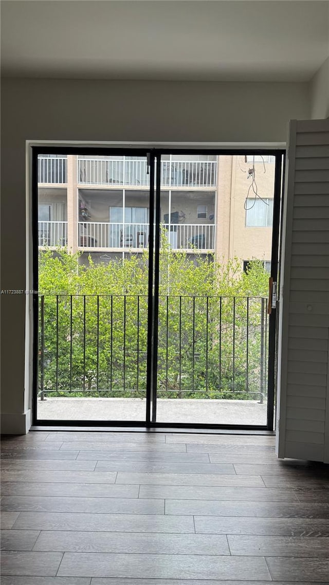 6850 NW 173rd Dr Unit 103, Hialeah, FL 33015 - unfurnished room with wood finished floors