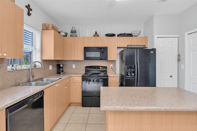 kitchen with sink, a kitchen island, light brown cabinetry, light tile patterned floors, and black appliances