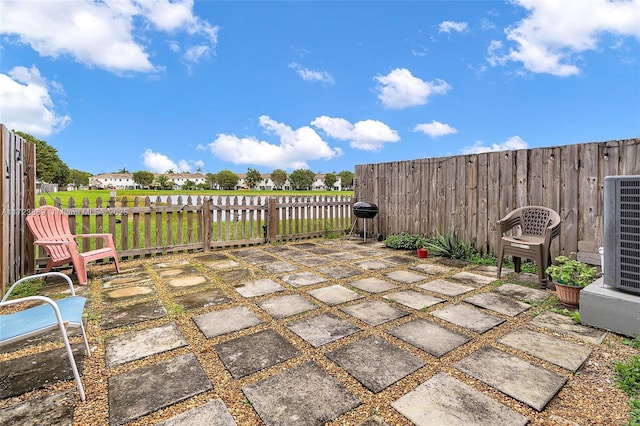 view of patio / terrace with central AC unit