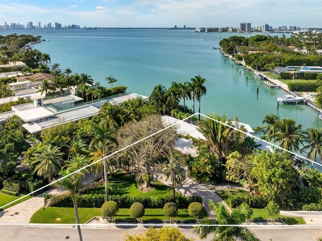 birds eye view of property featuring a water view