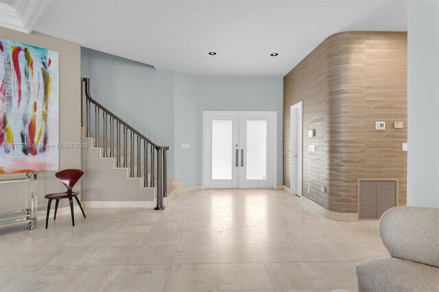 entrance foyer featuring french doors