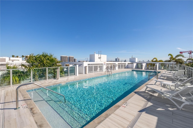 view of pool featuring a patio