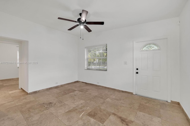 entrance foyer featuring ceiling fan