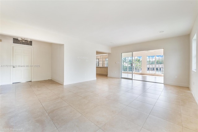 view of tiled spare room