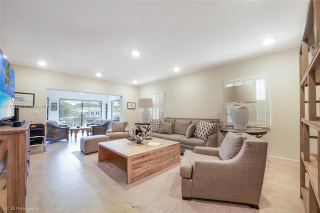 living room with light tile patterned flooring