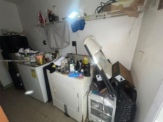 laundry room featuring washer / dryer