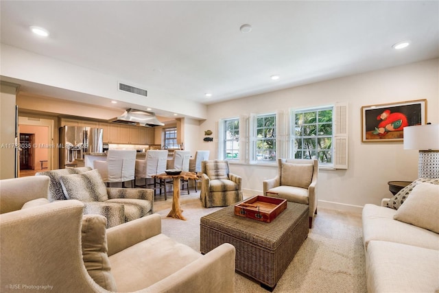 living room with light carpet