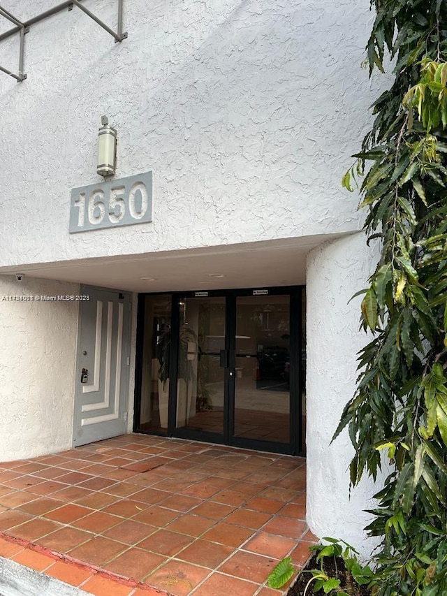 property entrance with french doors