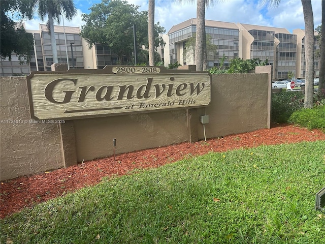 view of community sign