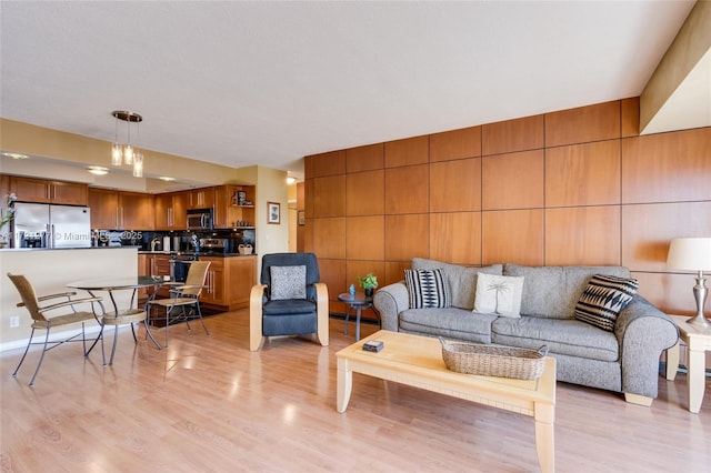 living room with light hardwood / wood-style floors