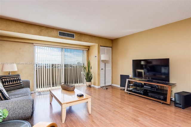 living room with hardwood / wood-style flooring