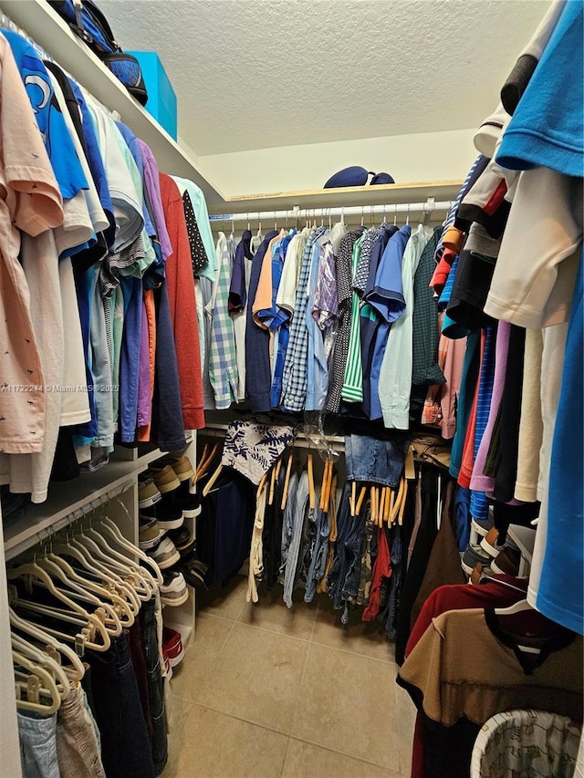 walk in closet featuring tile patterned floors