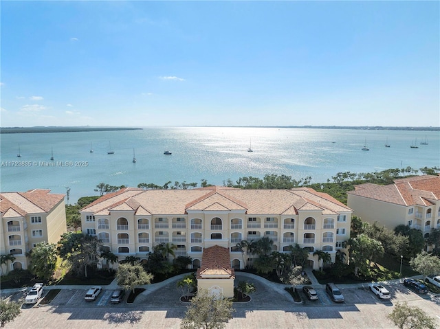 drone / aerial view featuring a water view